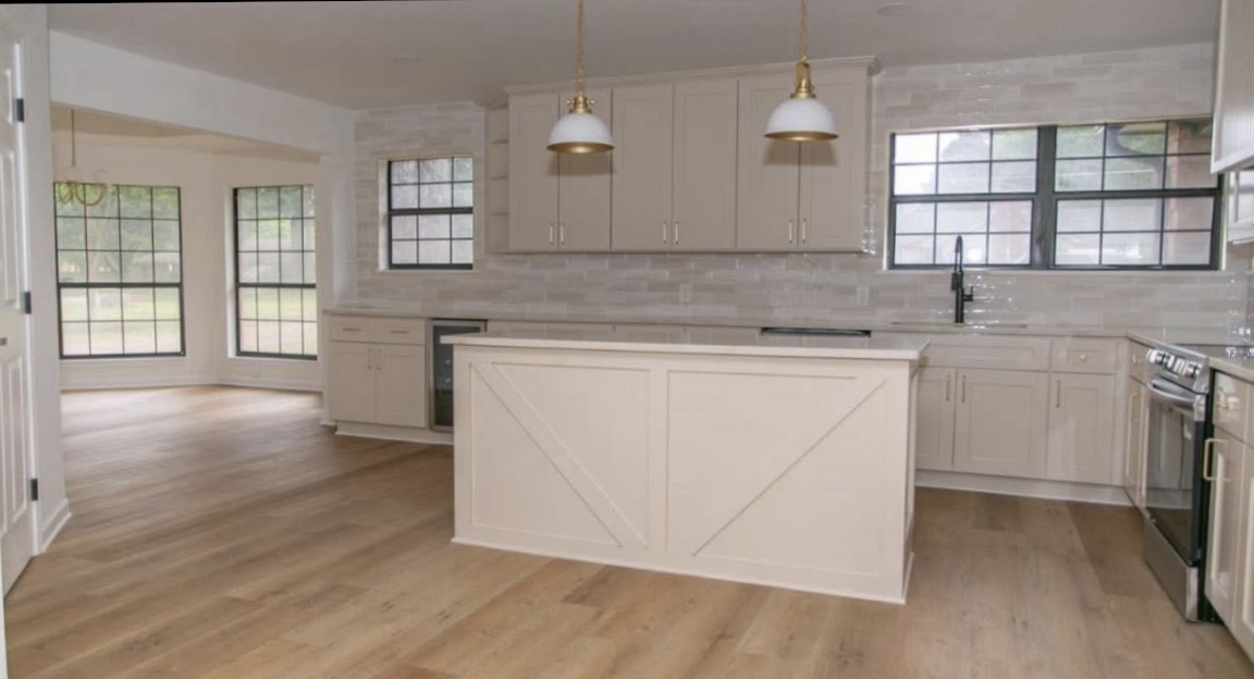Kitchen — island and pendant lighting · After renovation · Longview, Texas