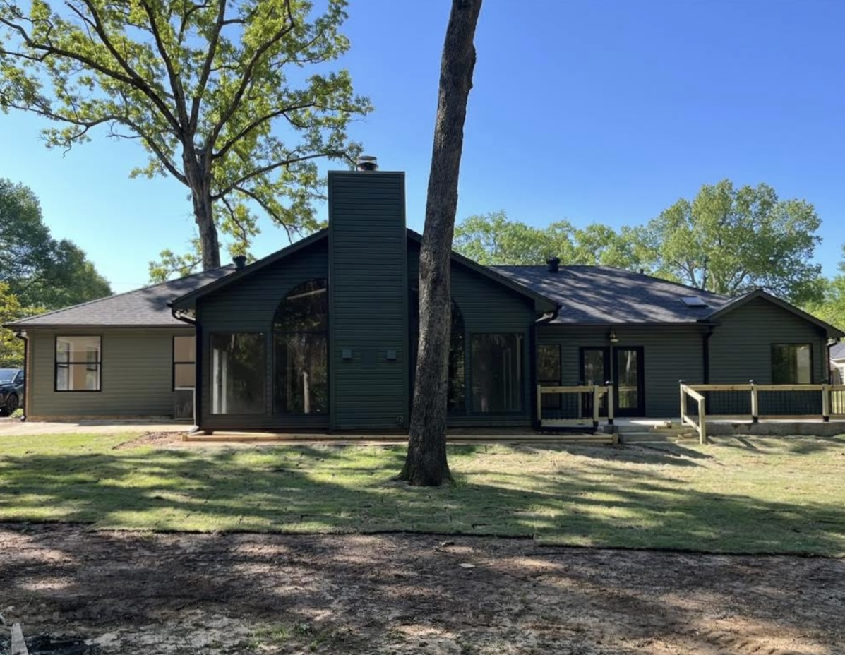 Rear exterior and backyard · After renovation · Longview, Texas