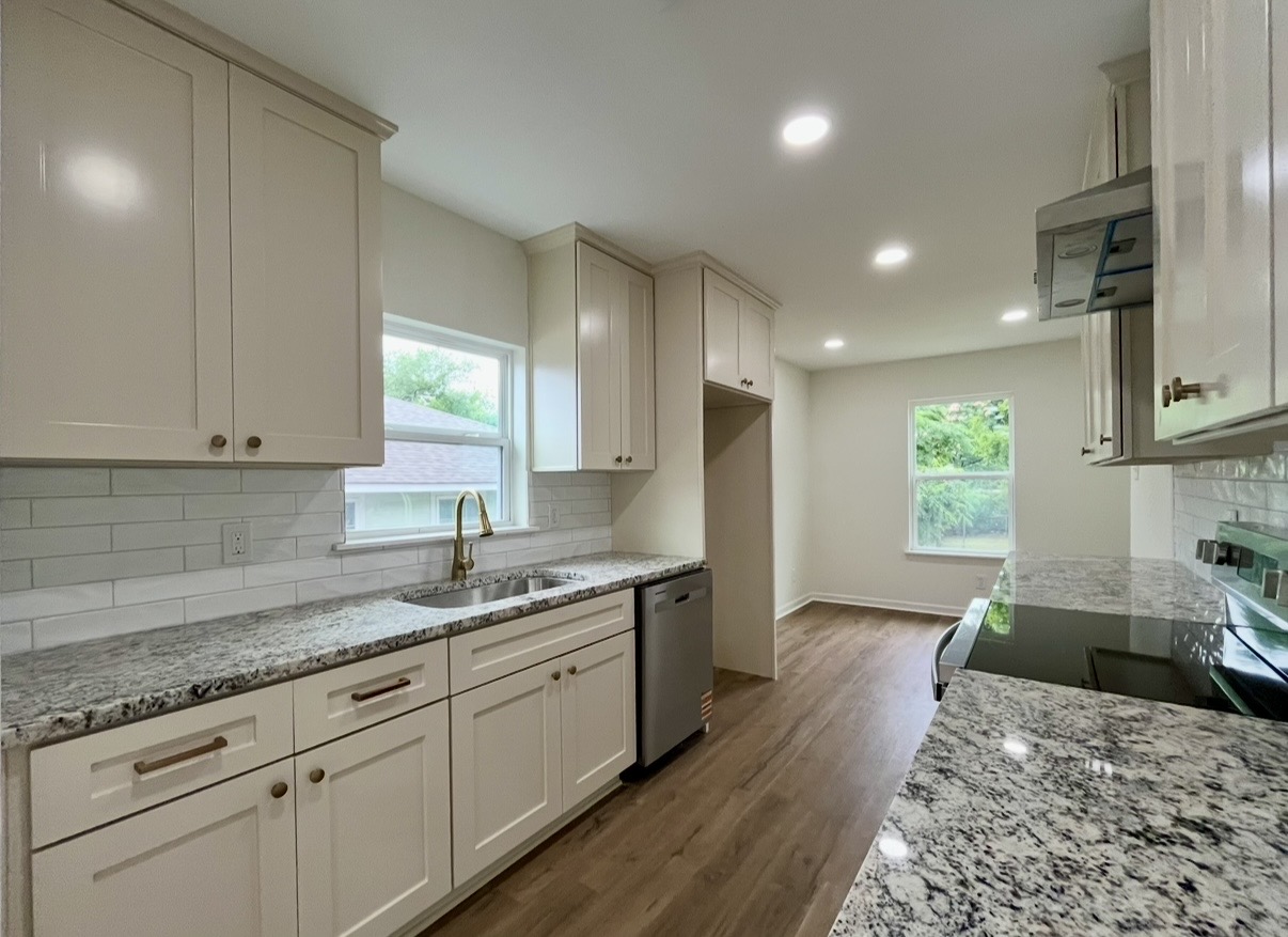 Kitchen — sink and cabinetry · After renovation · Tyler, Texas