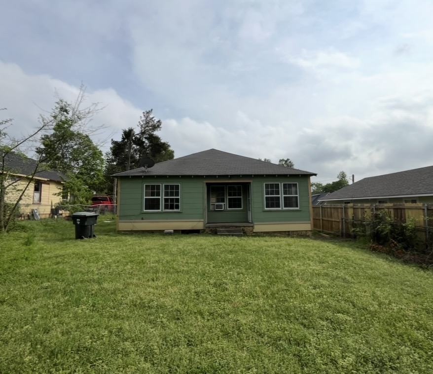 Rear exterior and lawn · Before renovation · Tyler, Texas