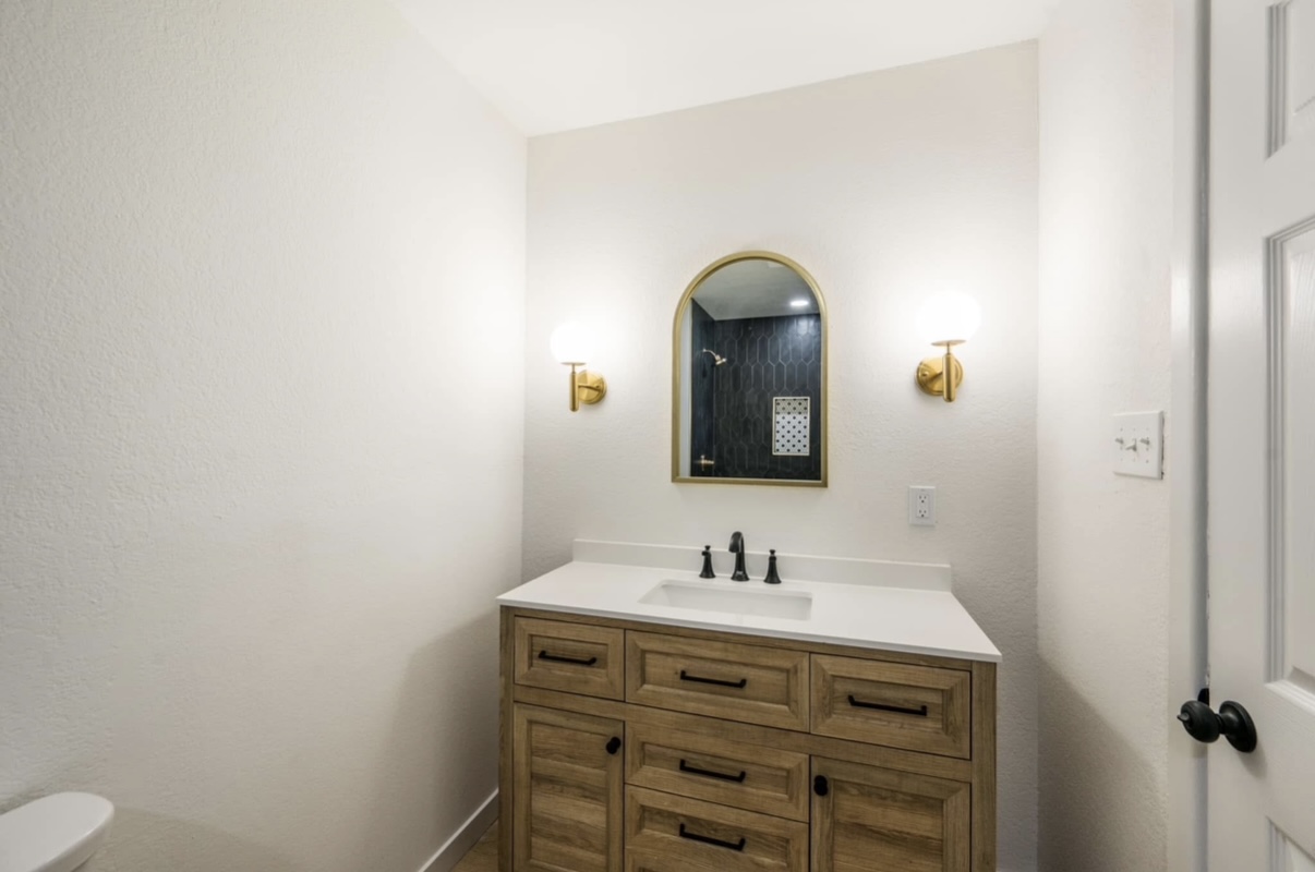 Primary bathroom vanity after renovation · Longview, Texas