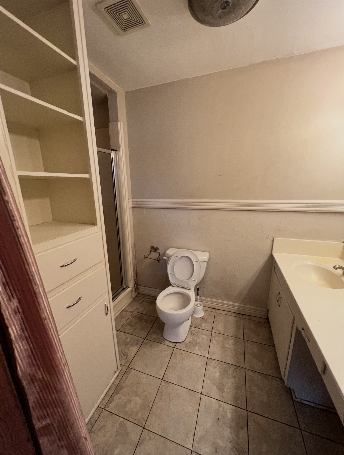 Primary bathroom vanity before renovation · Longview, Texas