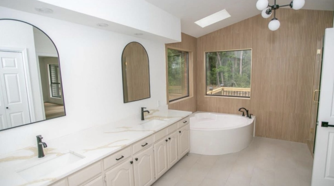 Bathroom — double vanity and freestanding tub · After renovation · Longview, Texas