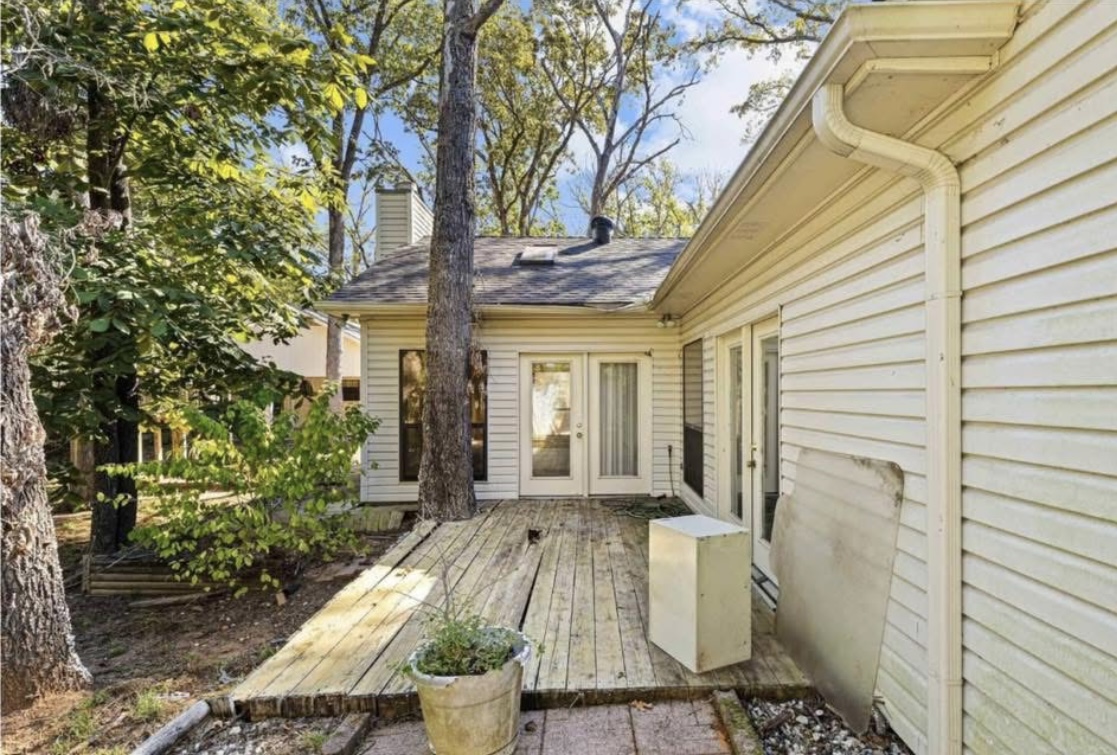 Rear entrance and wood deck · Before renovation · Longview, Texas