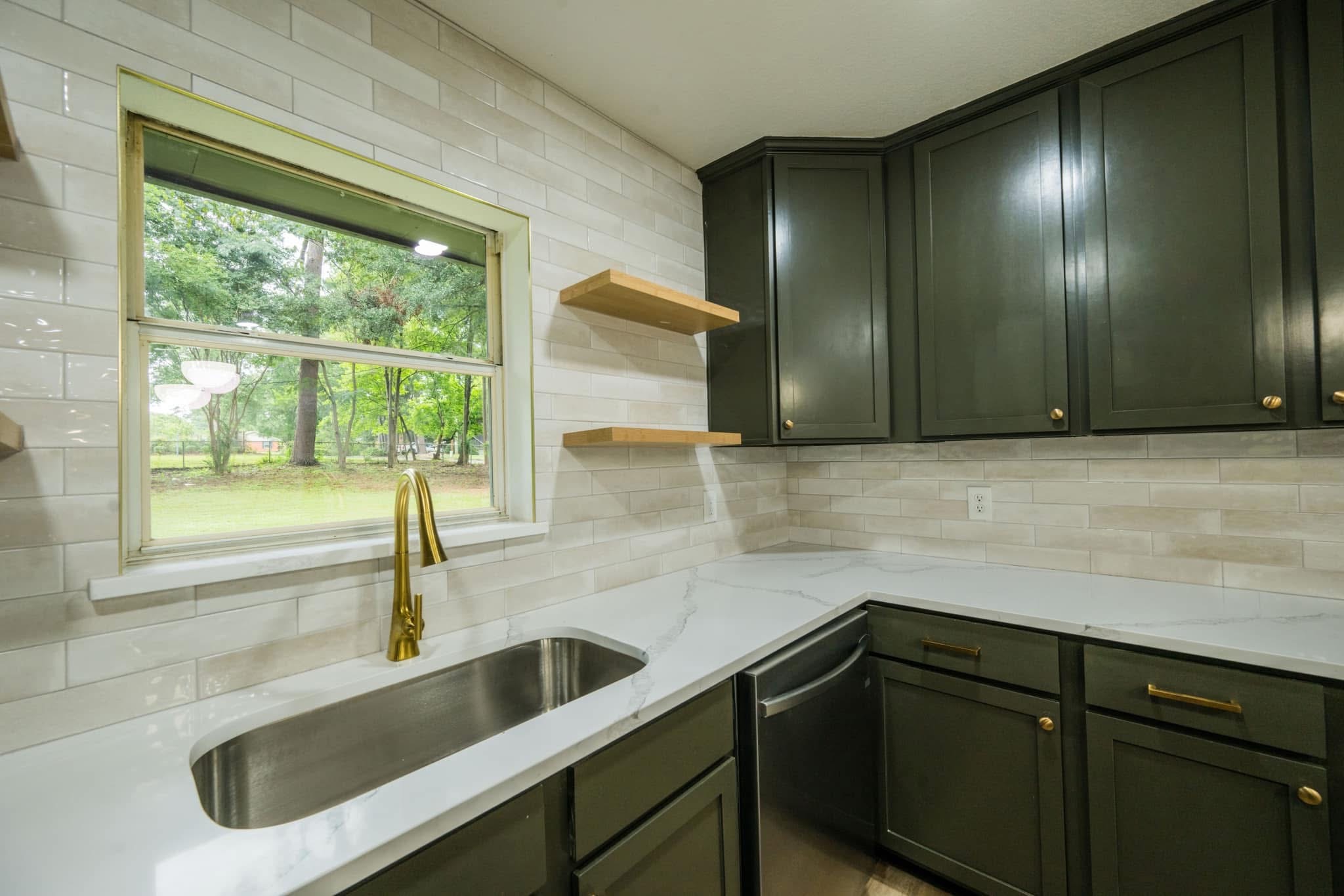 Completed kitchen — sink, tile and countertops · Longview, Texas