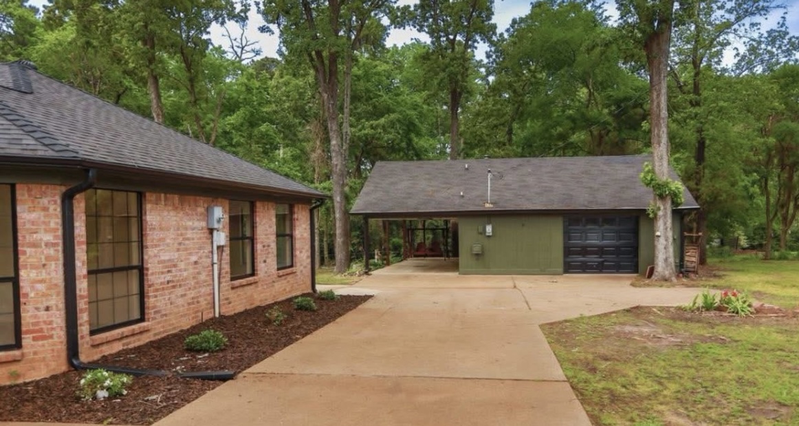 Driveway and separate outbuilding · After renovation · Longview, Texas