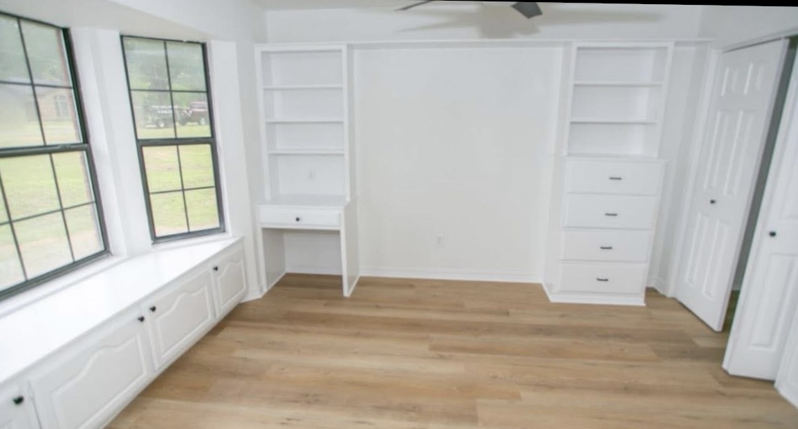 Room — window seat and built-in shelving · After renovation · Longview, Texas