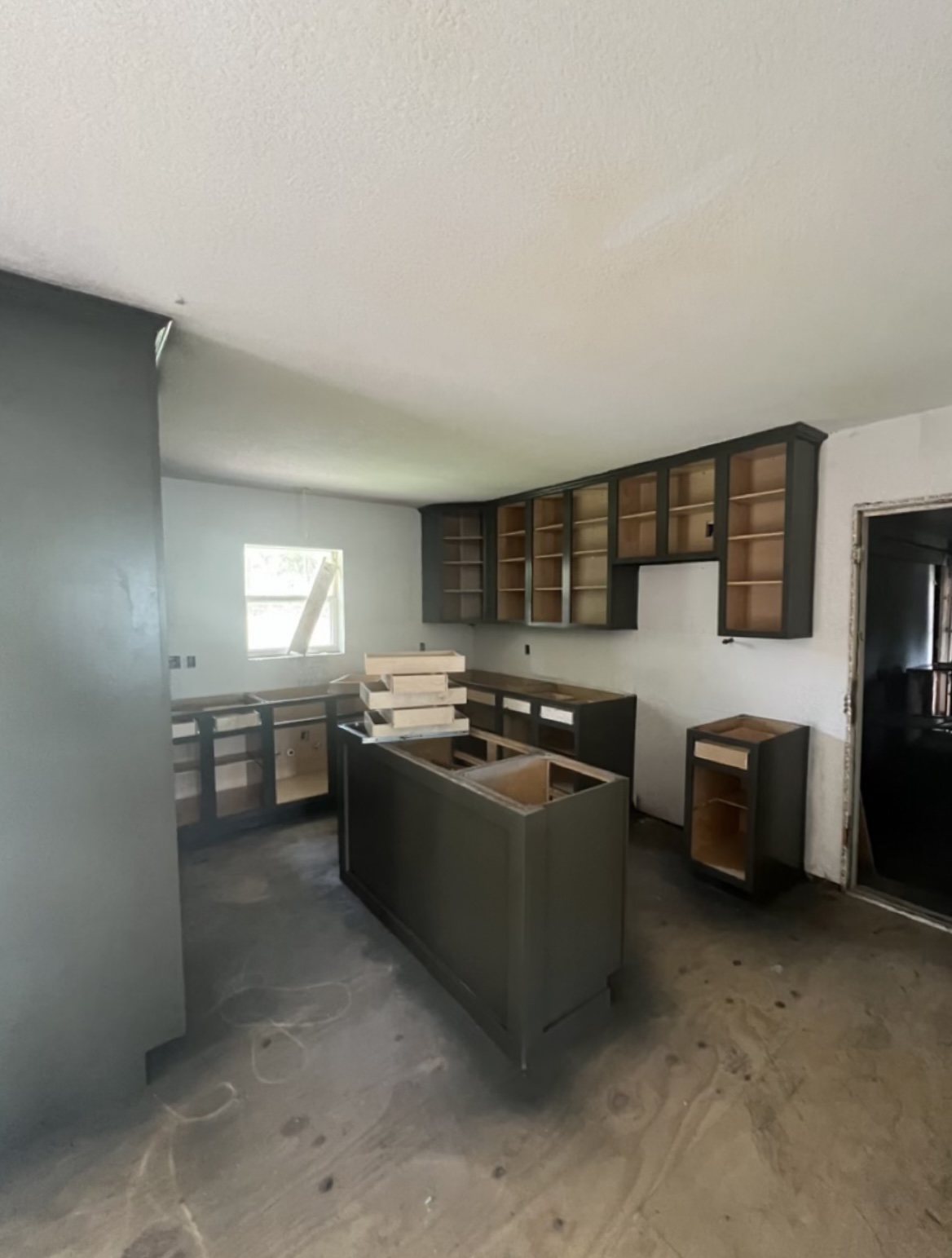 Kitchen during renovation — cabinetry installation · Longview, Texas