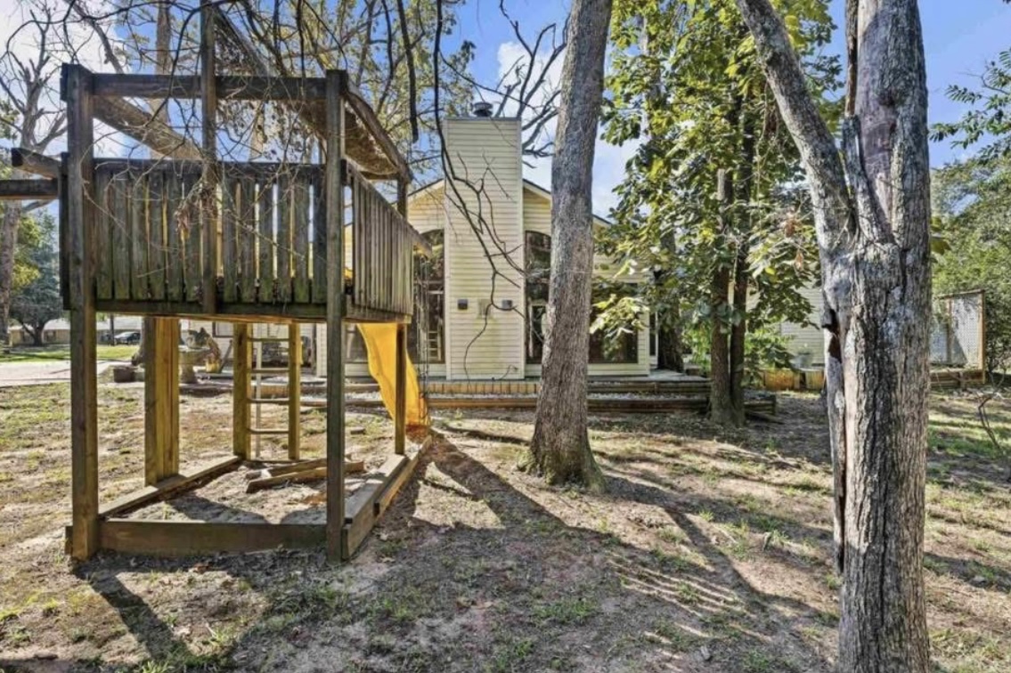Backyard and rear exterior · Before renovation · Longview, Texas