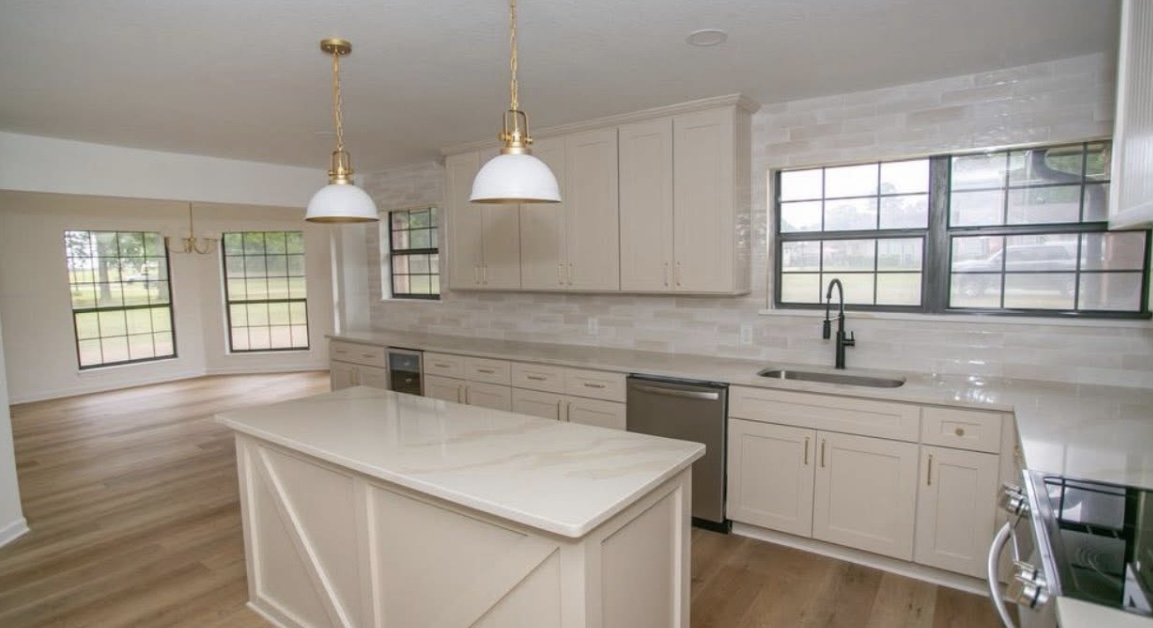 Kitchen — island, sink and windows · After renovation · Longview, Texas