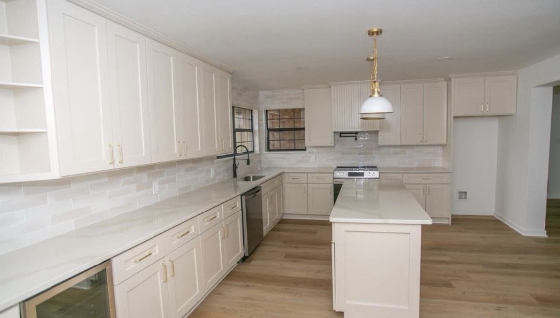 Kitchen — sink wall and island · After renovation · Longview, Texas