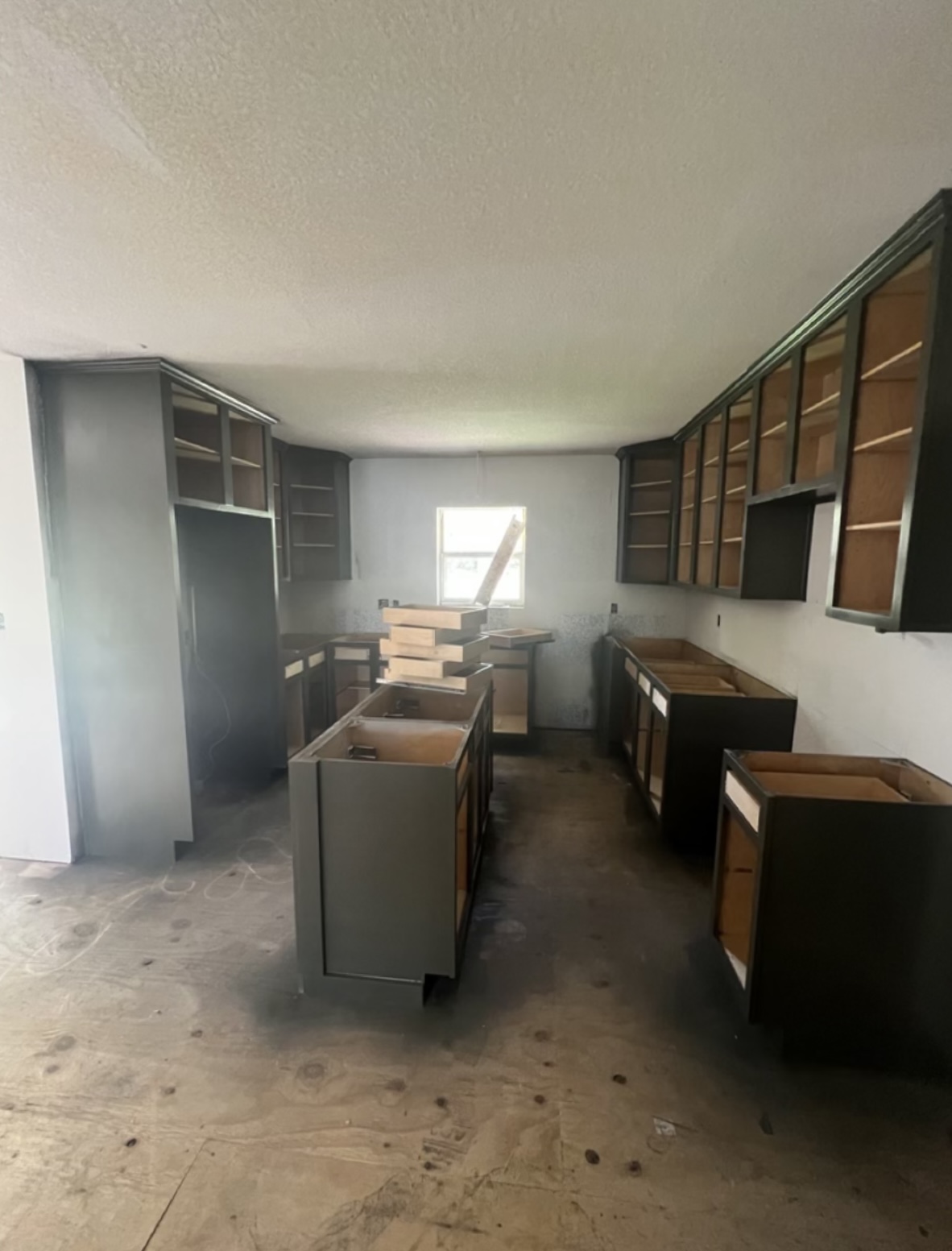 Kitchen during renovation — cabinet layout · Longview, Texas