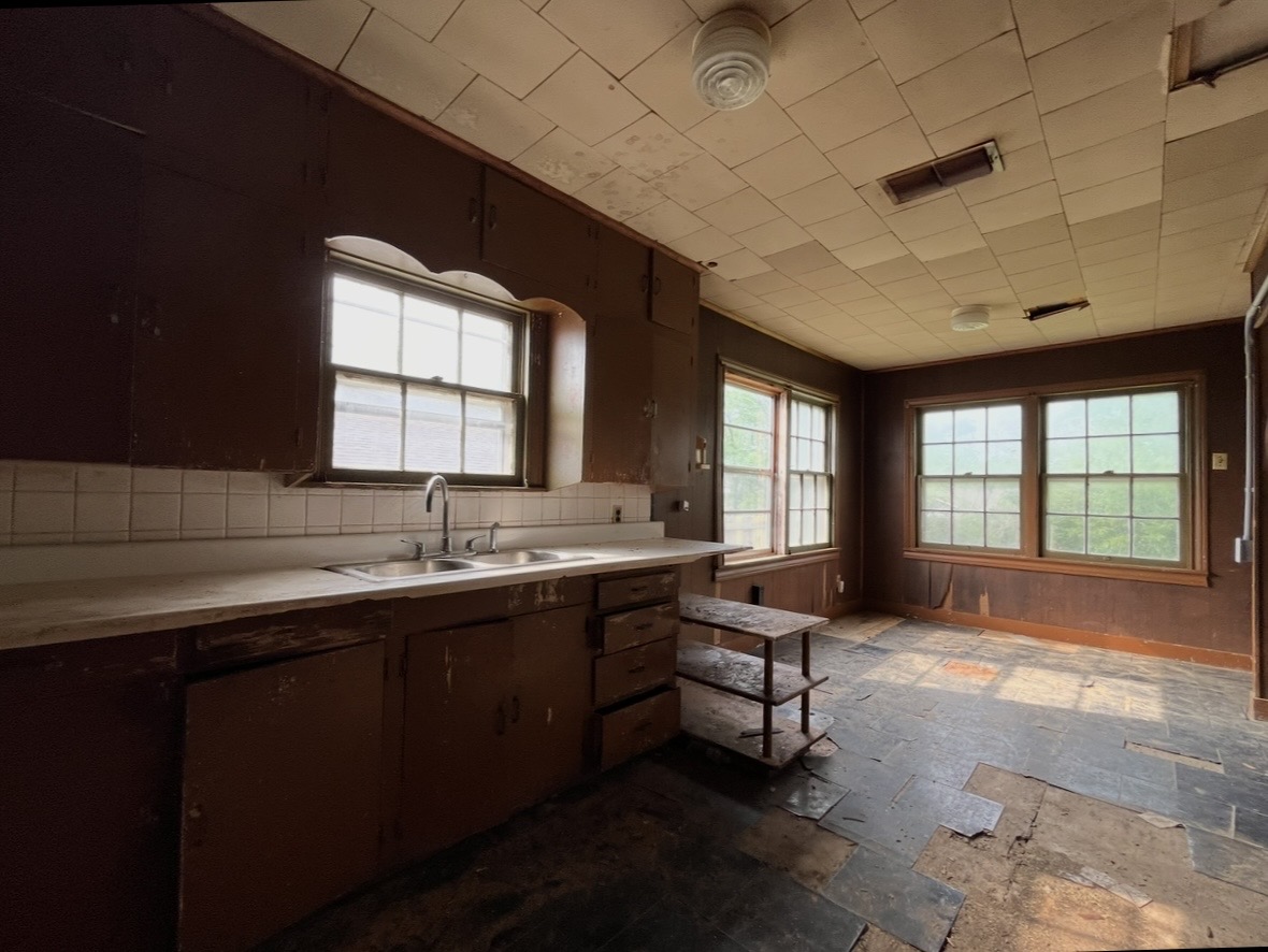Kitchen — sink and windows · Before renovation · Tyler, Texas