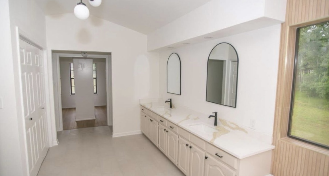 Bathroom — double vanity and mirrors · After renovation · Longview, Texas