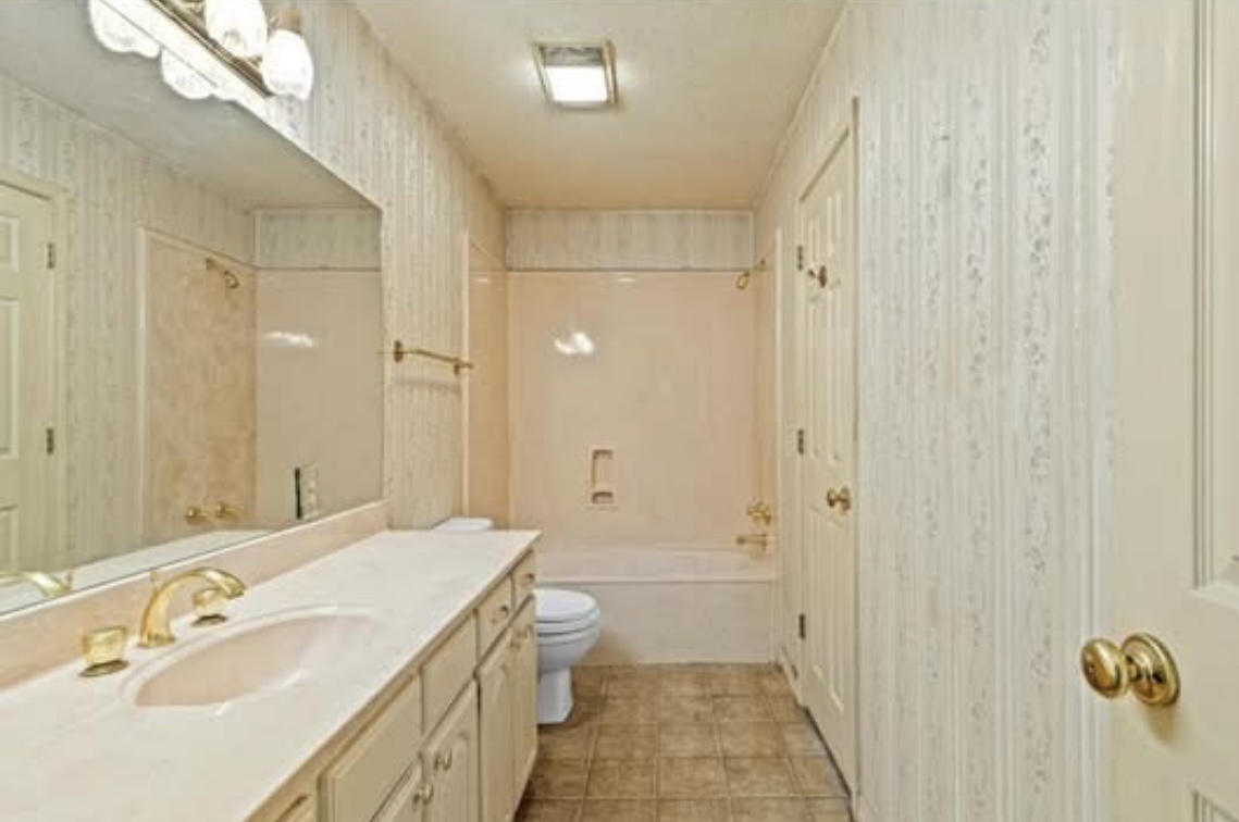 Bathroom — vanity and existing tub surround · Before renovation · Longview, Texas